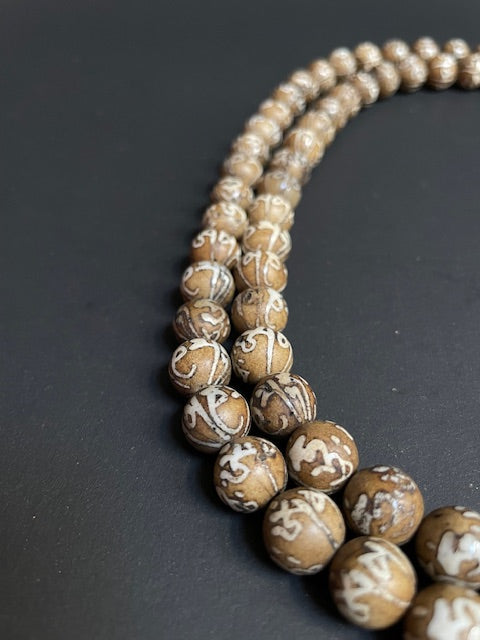 Lange mala met mantra uit Nepal - beige