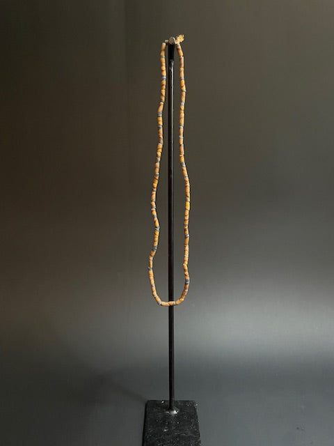 Vintage handelskralen ketting uit Ghana geel gestreept
