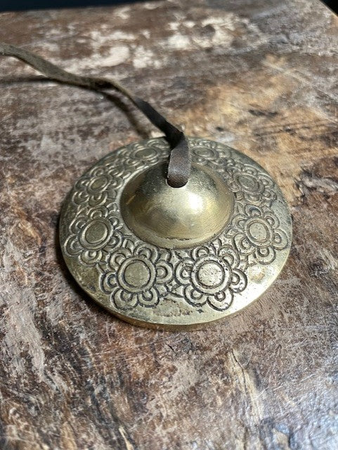 Tingsha with flowers from Nepal