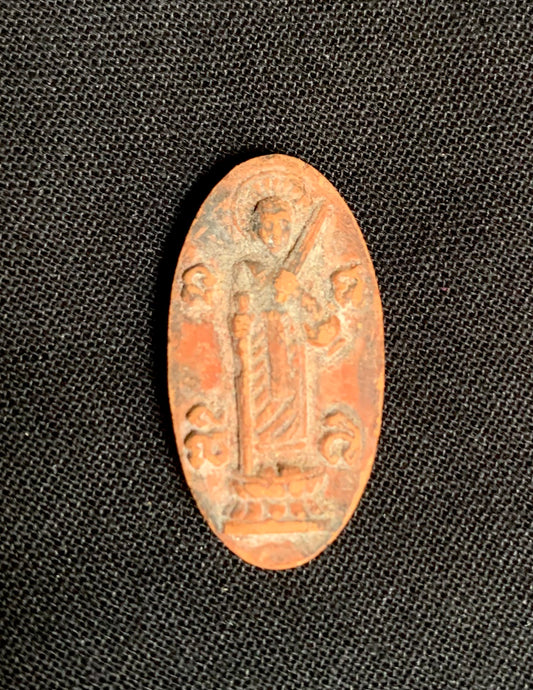 Buddhist earthenware amulet from Thailand