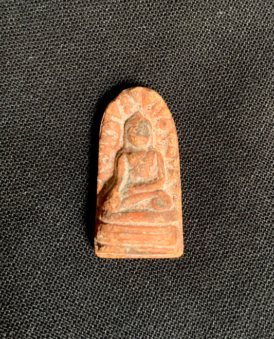 Buddhist earthenware amulet from Thailand