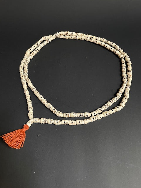 Long yak bone necklace with skulls - white