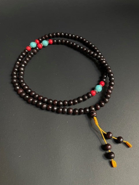 Long mala from Nepal - black with orange cord